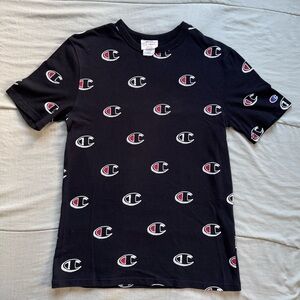 champion black tee with red and white logo pattern